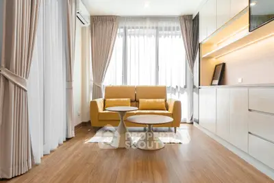 Modern living room with stylish furniture and natural light