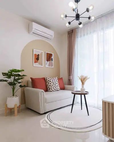 Stylish living room with modern decor, featuring a cozy sofa, chic lighting, and large windows for natural light.