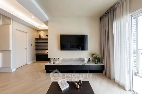 Modern living room with sleek TV setup and elegant decor