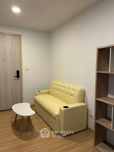 Cozy living room with modern yellow sofa and stylish wooden furniture, perfect for relaxation.