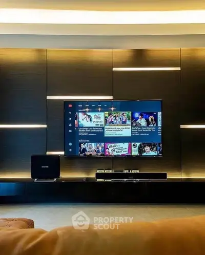 Modern living room with sleek entertainment center and ambient lighting