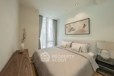 Elegant bedroom with modern decor and natural light