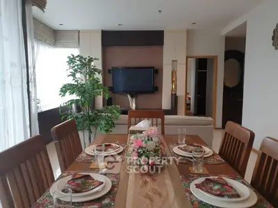 Elegant dining area with stylish decor and natural light in modern apartment