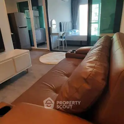 Modern studio apartment with open layout and stylish furnishings