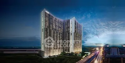 Stunning high-rise building with modern architecture and cityscape view at dusk.