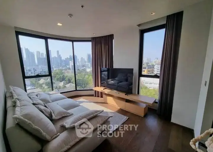 Luxurious living room with panoramic city view and modern furnishings