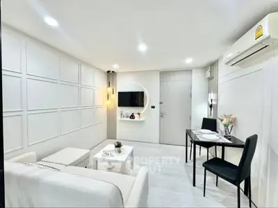 Modern white living room with sleek furniture and ambient lighting