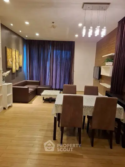 Spacious living room with elegant dining area and modern decor