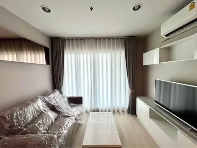 Modern living room with sleek furniture and natural light