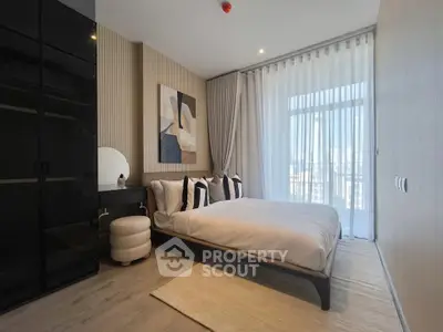 Luxurious modern bedroom with elegant decor and city view