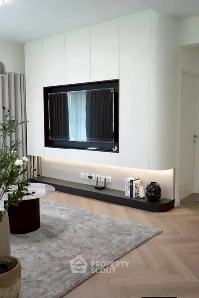 Modern living room with sleek TV wall unit and stylish decor