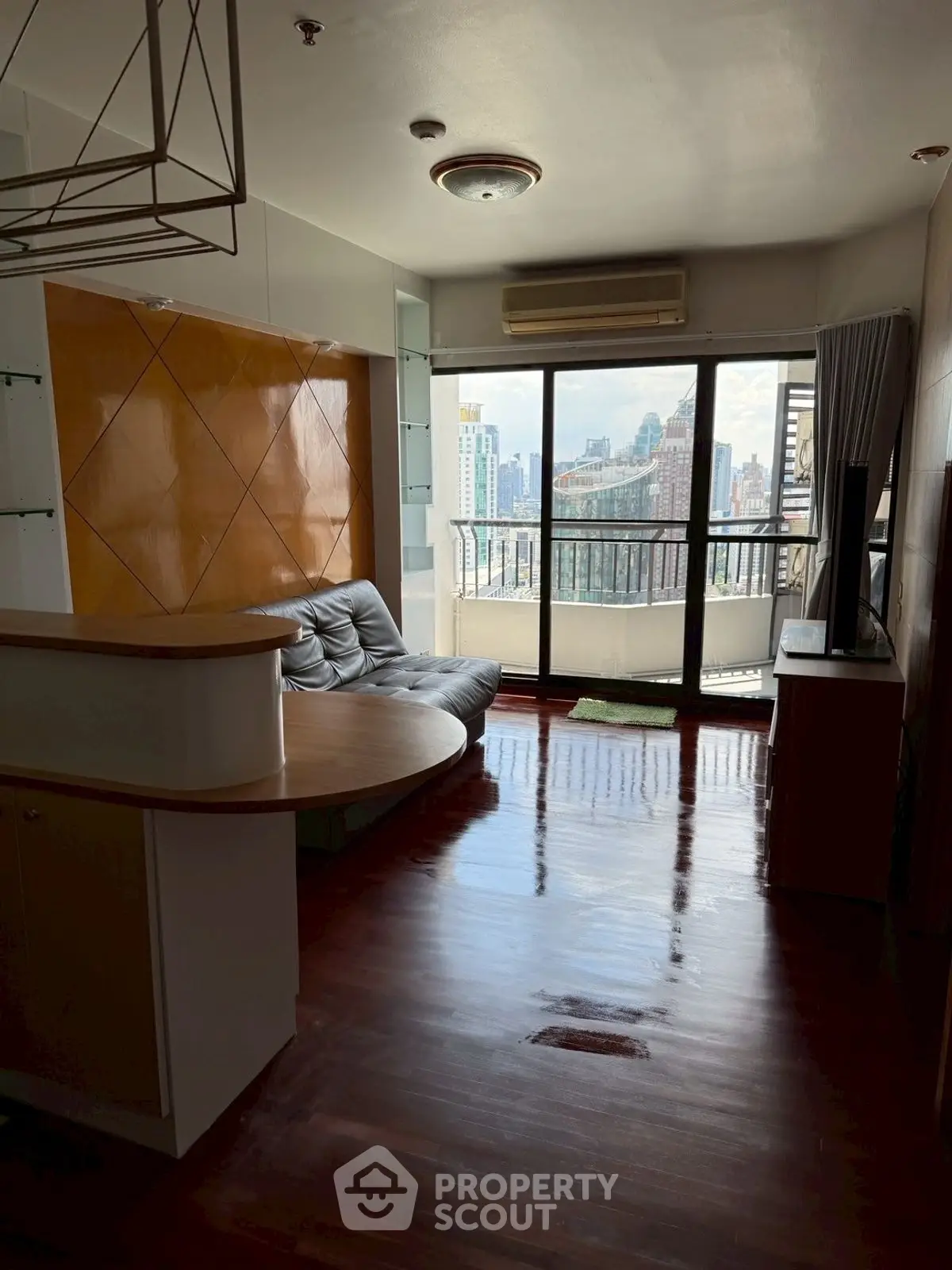 Stylish living room with city view and modern furnishings