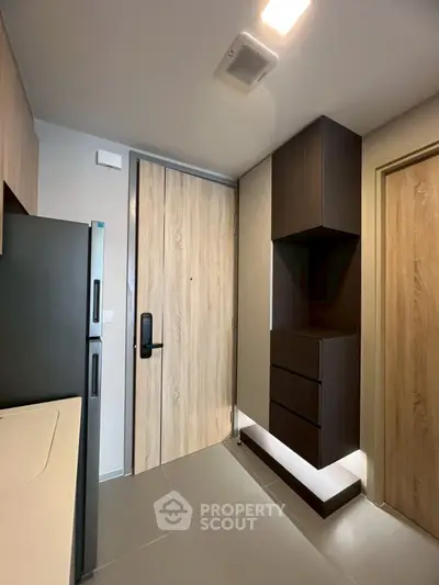 Modern kitchen with sleek cabinetry and integrated appliances