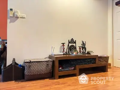 Cozy interior with wooden floor and decorative console table