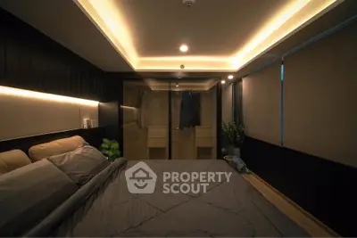 Luxurious bedroom with modern lighting and elegant decor