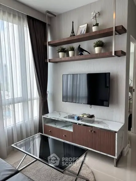 Modern living room with stylish TV unit and elegant decor
