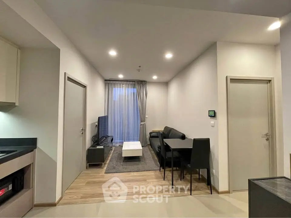 Modern living room with sleek furniture and open layout, perfect for contemporary living.