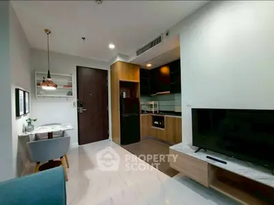 Modern apartment interior with open kitchen and cozy living area