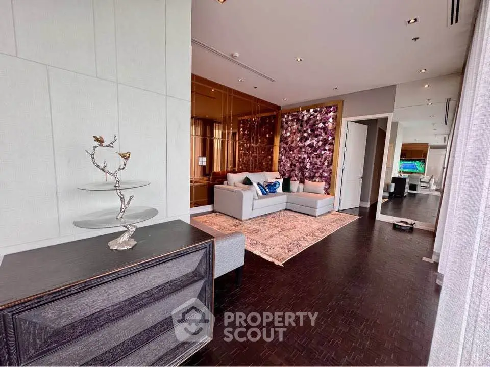 Luxurious living room with elegant decor and spacious layout in modern apartment.