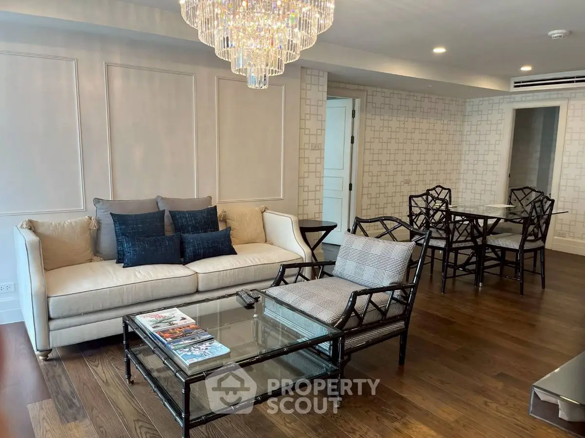 Luxurious living room with elegant chandelier and stylish furniture