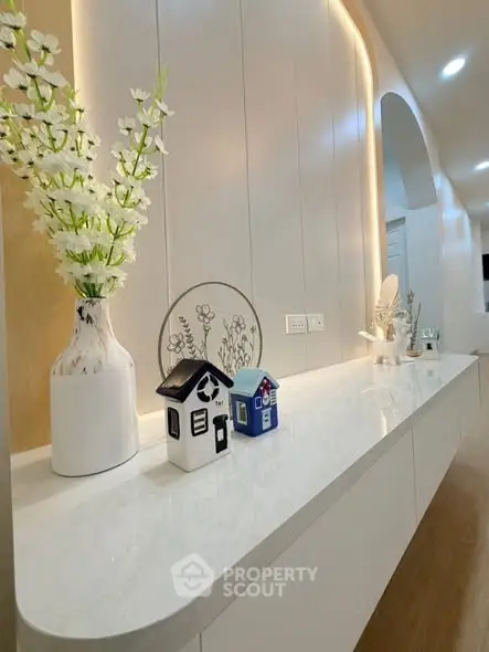 Elegant hallway with modern decor and ambient lighting