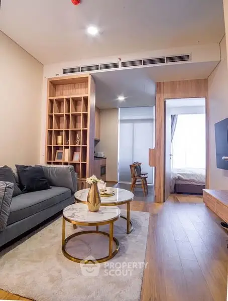 Modern living room with stylish furniture and open layout in a cozy apartment.