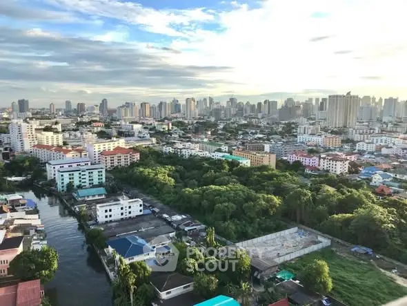 Stunning cityscape view with lush greenery and skyline in the background, perfect for urban living.