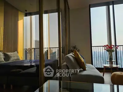 Luxurious living room with floor-to-ceiling windows and stunning city view