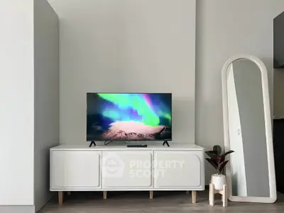 Modern living room with sleek TV stand and stylish decor