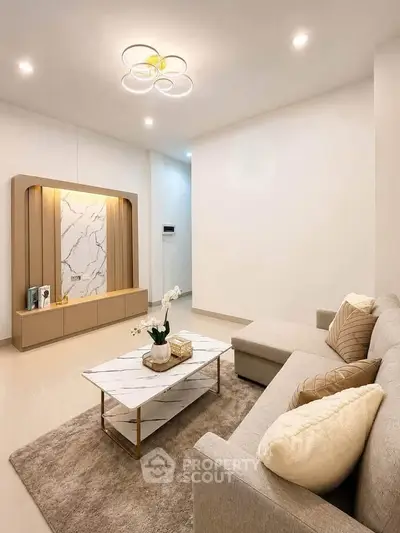 Modern living room with elegant decor and cozy seating area