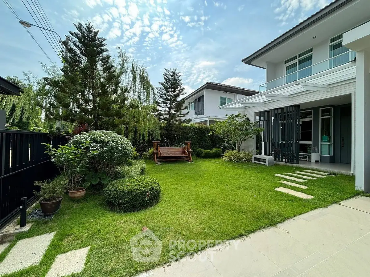 Charming suburban home with lush garden and modern architecture
