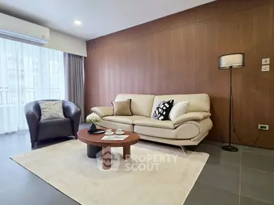Modern living room with stylish furniture and natural light