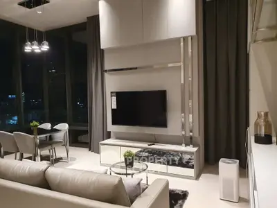 Luxurious modern living room with elegant decor and city view