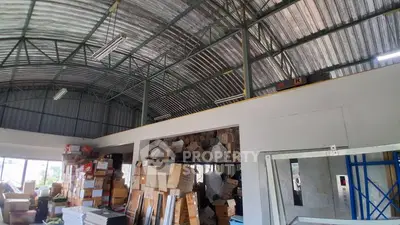 Spacious warehouse interior with high ceilings and ample storage space