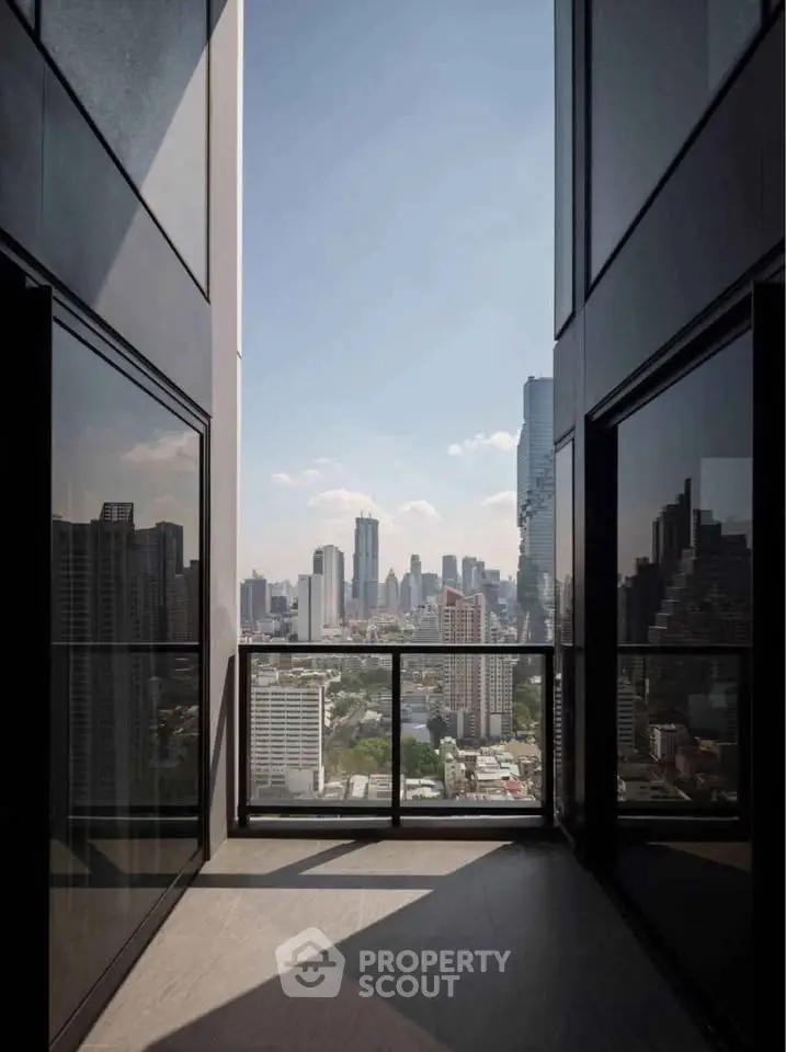 Stunning cityscape view from a modern high-rise balcony, perfect for urban living enthusiasts.