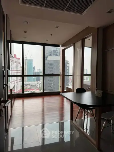 Spacious modern study with city view and sleek wooden flooring