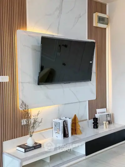 Modern living room with stylish TV setup and elegant decor