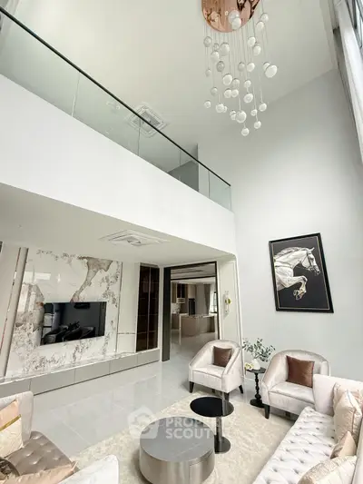 Luxurious modern living room with high ceiling and elegant decor