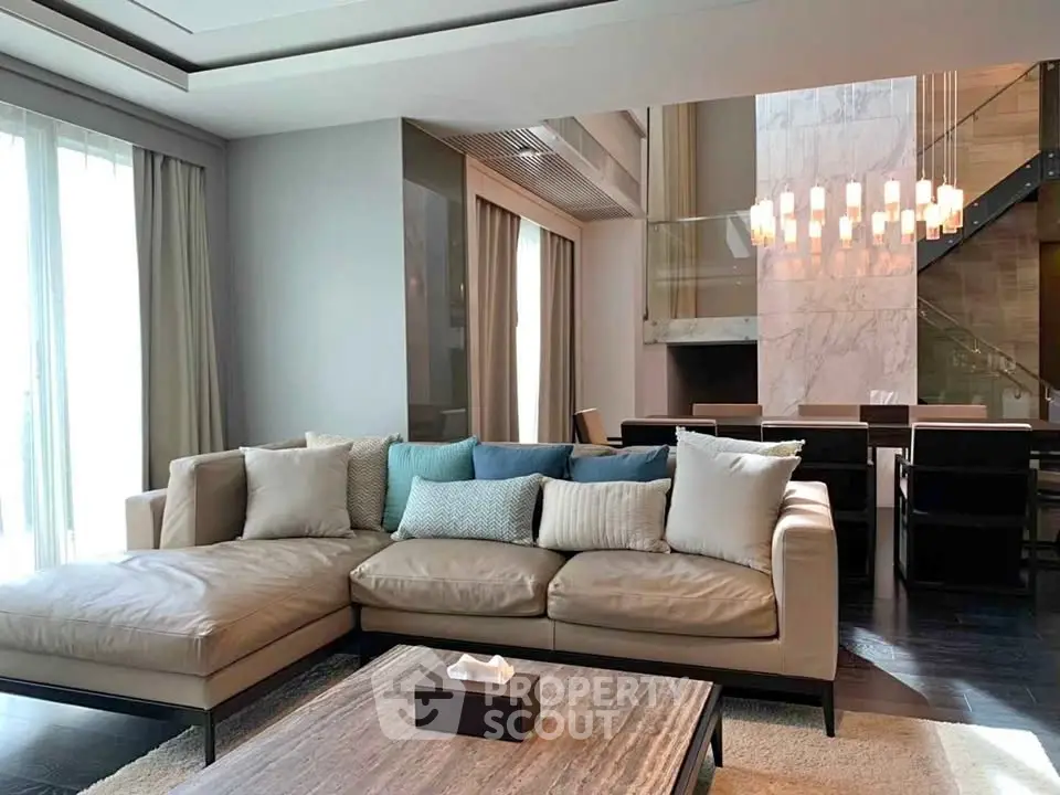 Luxurious living room with elegant decor and spacious seating area
