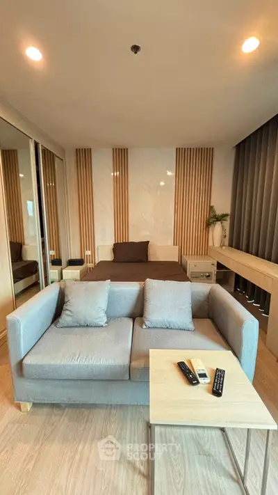 Modern studio apartment with stylish decor and cozy living area