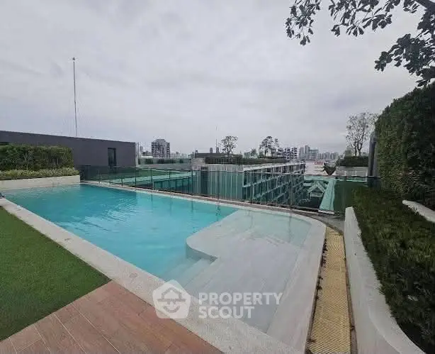 Luxurious rooftop pool with stunning city views and modern design.