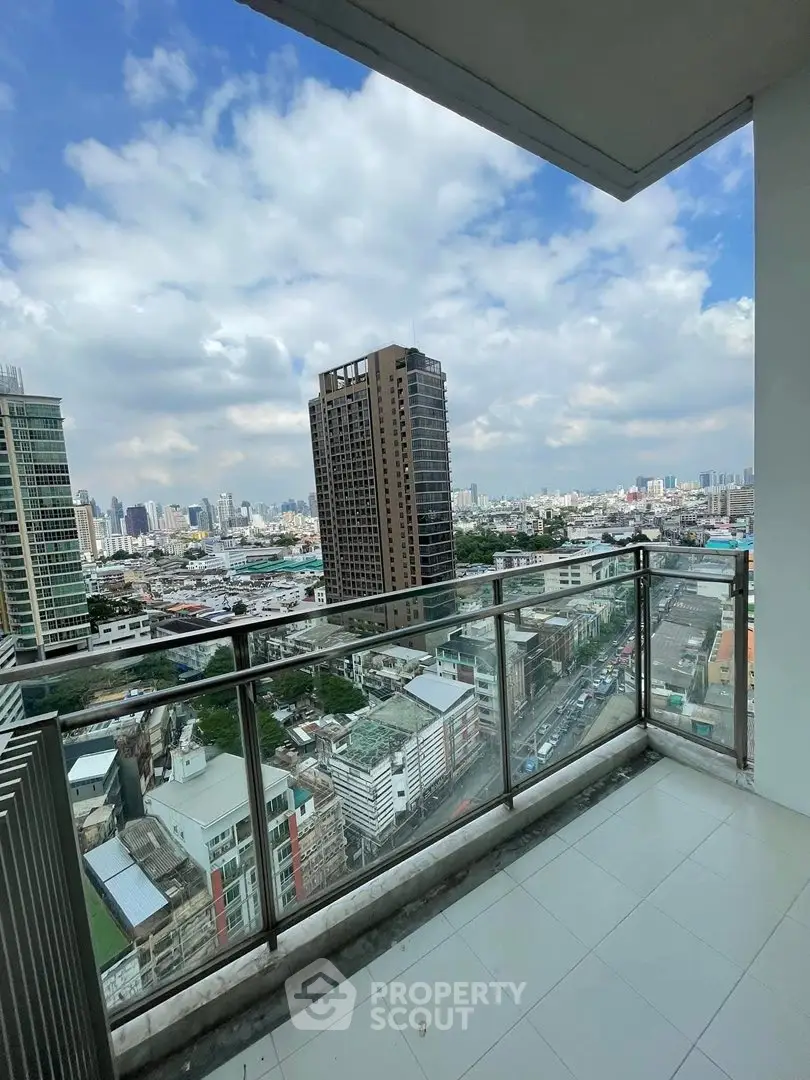 Stunning cityscape view from a high-rise balcony, perfect for urban living enthusiasts.