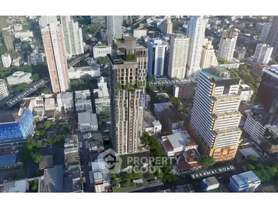 Stunning aerial view of a modern high-rise building in a bustling cityscape, showcasing prime urban living.