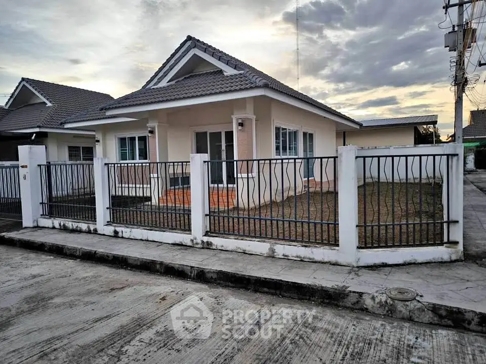 Charming single-story house with fenced yard and modern design in a serene neighborhood.