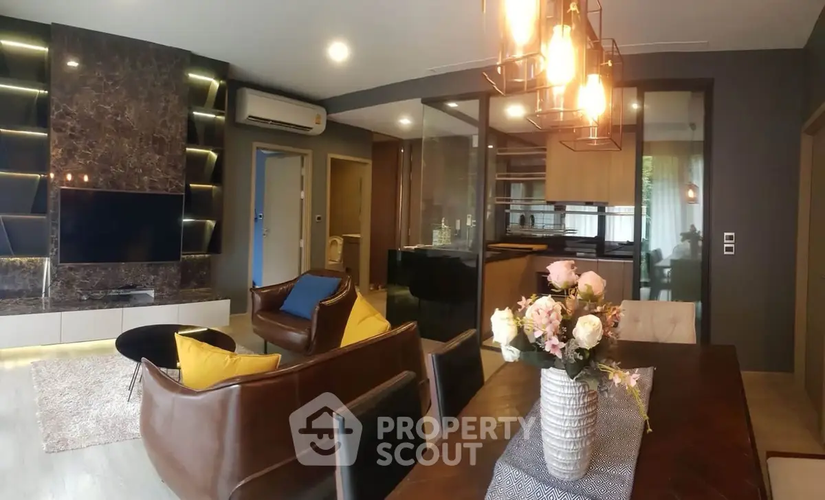 Luxurious modern living room with elegant decor and open kitchen layout