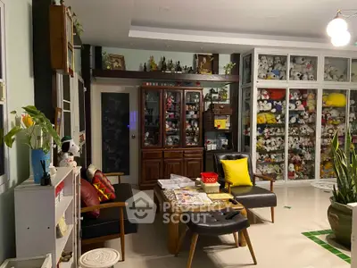 Charming living room with plush toy collection and modern decor