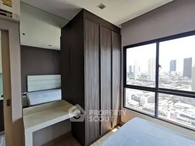 Modern bedroom with city view and stylish wardrobe