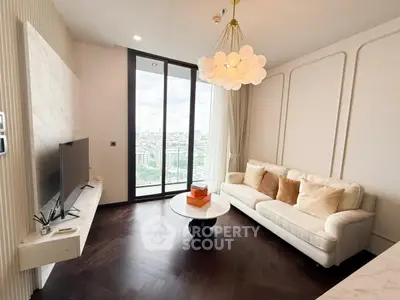 Elegant living room with city view, modern decor, and stylish lighting