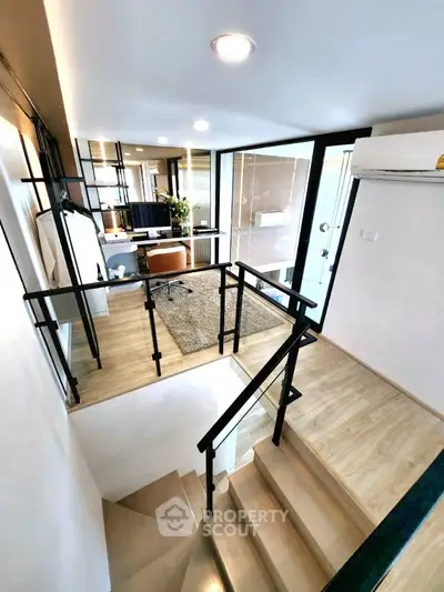 Modern loft-style apartment with open layout and sleek design