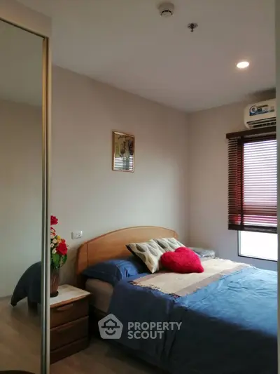 Cozy bedroom with modern decor and natural light